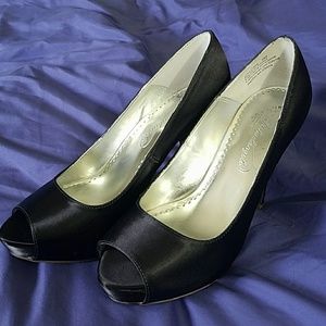Black peeptoe pumps